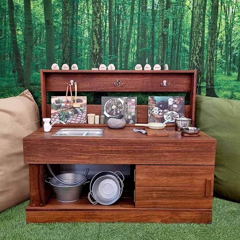 Bellbird outdoor mud kitchen with accessories front view